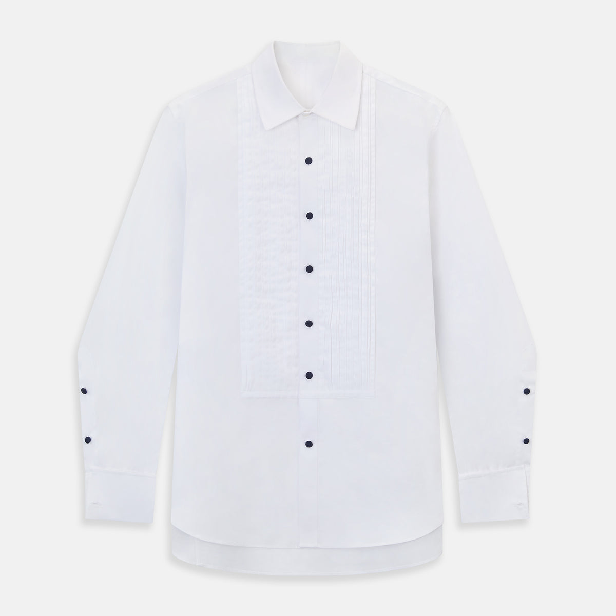 View 10 of product The Casino Royale White Dress Shirt in Cotton by Turnbull & Asser UK is a long-sleeve white dress shirt, crafted from crisp white cotton poplin with a pleated bib front, black buttons, and a classic collar, shown laid flat on a white background.