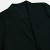 View 2 of product The Turnbull & Asser Forest Green Knitted London Blazer showcases notch lapels, two buttons, patch and chest pockets on a white background—a modern classic for timeless style.