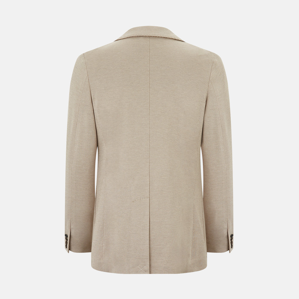 The Turnbull & Asser UK Sand Silk & Cotton Bath Blazer showcases Italian craftsmanship with notched lapels, two front buttons, large patch pockets, and a chest pocket, all set against a plain white background.