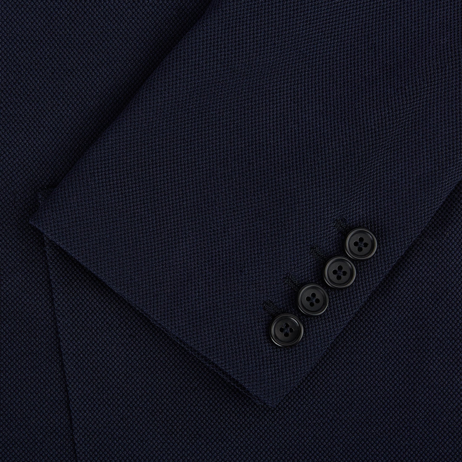 View 4 of product The Turnbull & Asser UK Navy Silk & Cotton Bath Blazer for men features notch lapels, two front pockets, a chest pocket, and a single-breasted button closure, crafted with refined Italian tailoring and shown on a white background.