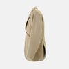 View 3 of product Riviera Sand Oversized Blazer in Cotton by Turnbull & Asser UK, featuring two spacious front pockets, a single chest pocket, and a classic notched lapel. Expertly tailored from premium cotton-nylon stretch fabric, this blazer is shown front-facing against a clean white background—an essential piece for achieving effortless sophistication.
