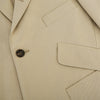 View 8 of product Riviera Sand Oversized Blazer in Cotton by Turnbull & Asser UK, featuring two spacious front pockets, a single chest pocket, and a classic notched lapel. Expertly tailored from premium cotton-nylon stretch fabric, this blazer is shown front-facing against a clean white background—an essential piece for achieving effortless sophistication.