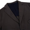 View 7 of product Introducing the Riviera Chocolate Oversized Blazer in Cotton by Turnbull & Asser UK—a dark brown blazer featuring two front buttons, three patch pockets, and notch lapels. Crafted from a cotton-nylon stretch fabric and showcased against a plain white background, this piece is a timeless addition to your autumn wardrobe.