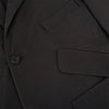 View 8 of product Introducing the Riviera Chocolate Oversized Blazer in Cotton by Turnbull & Asser UK—a dark brown blazer featuring two front buttons, three patch pockets, and notch lapels. Crafted from a cotton-nylon stretch fabric and showcased against a plain white background, this piece is a timeless addition to your autumn wardrobe.
