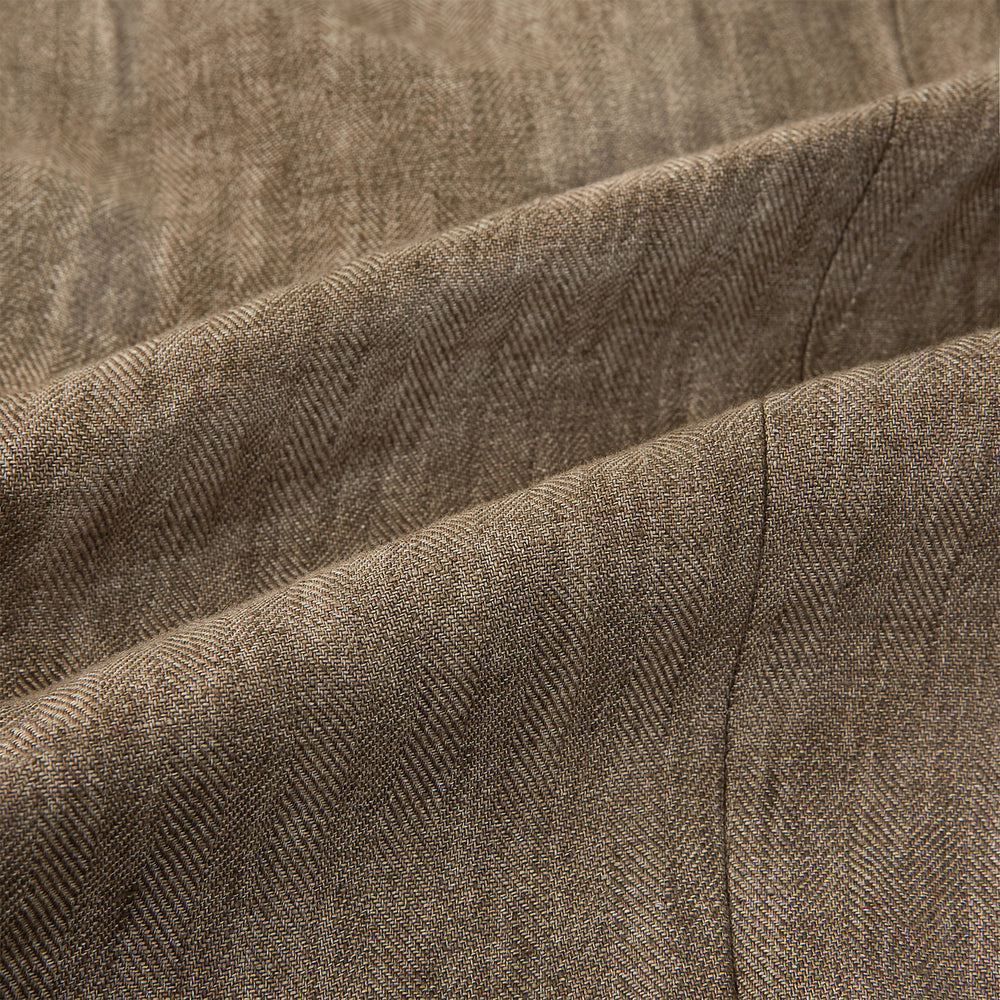 The Henley Pinecone Blazer in Linen by Turnbull & Asser UK features a brown double-breasted design with six black buttons, notch lapels, and three front pockets—ideal for effortless British summer dressing—shown against a plain white background.