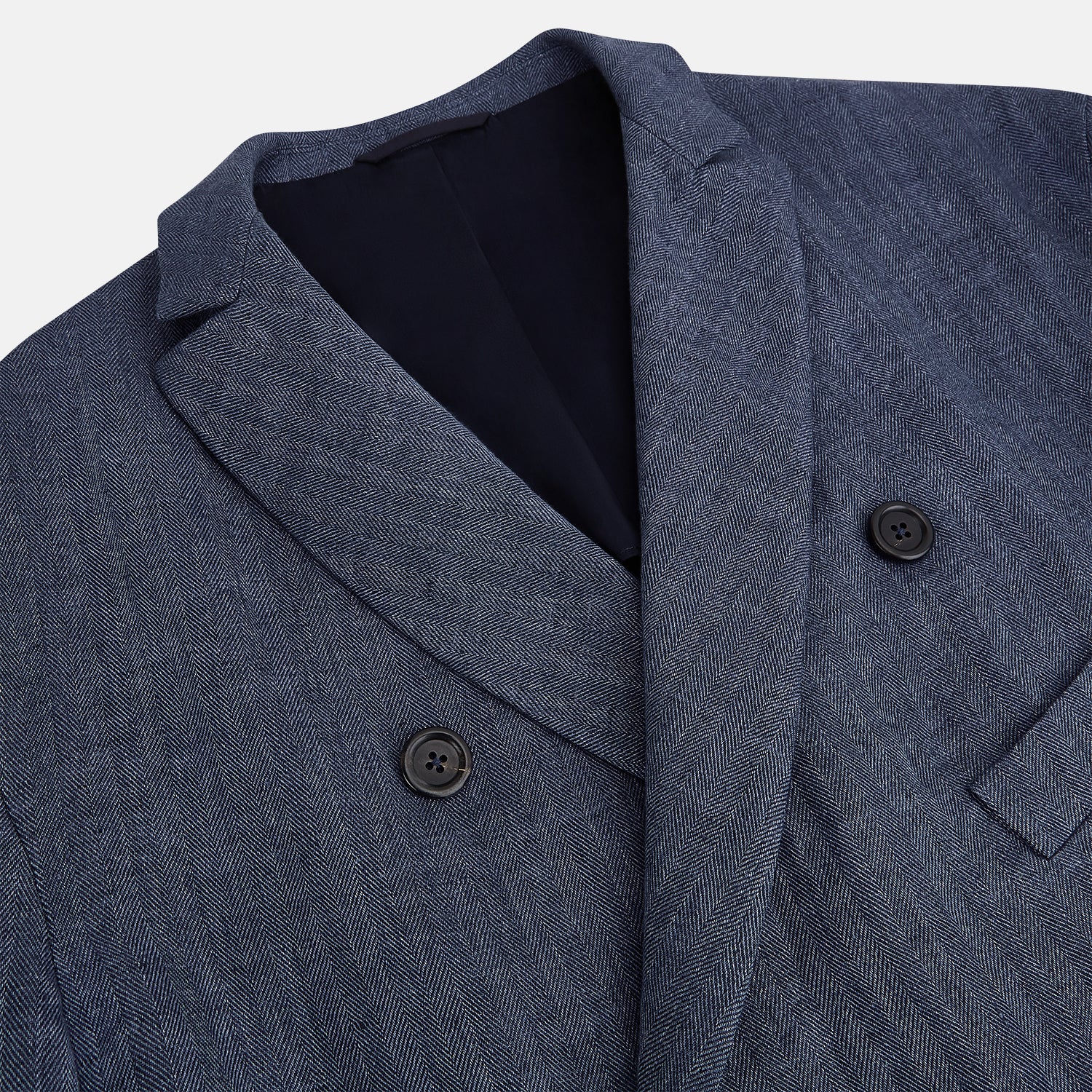 View 2 of product The Henley Denim Blazer in Linen by Turnbull & Asser UK features a double-breasted design with six black buttons, notch lapels, two front pockets, and a chest pocket—a timeless staple for effortless British summer dressing—displayed on a plain white background.