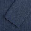 View 4 of product The Henley Denim Blazer in Linen by Turnbull & Asser UK features a double-breasted design with six black buttons, notch lapels, two front pockets, and a chest pocket—a timeless staple for effortless British summer dressing—displayed on a plain white background.