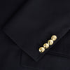 View 4 of product Turnbull & Asser UK Navy Single Breasted Classic Blazer in Wool Gabardine, a navy gabardine single-breasted blazer with two gold-tone buttons and a chest pocket, showcasing classic tailoring.