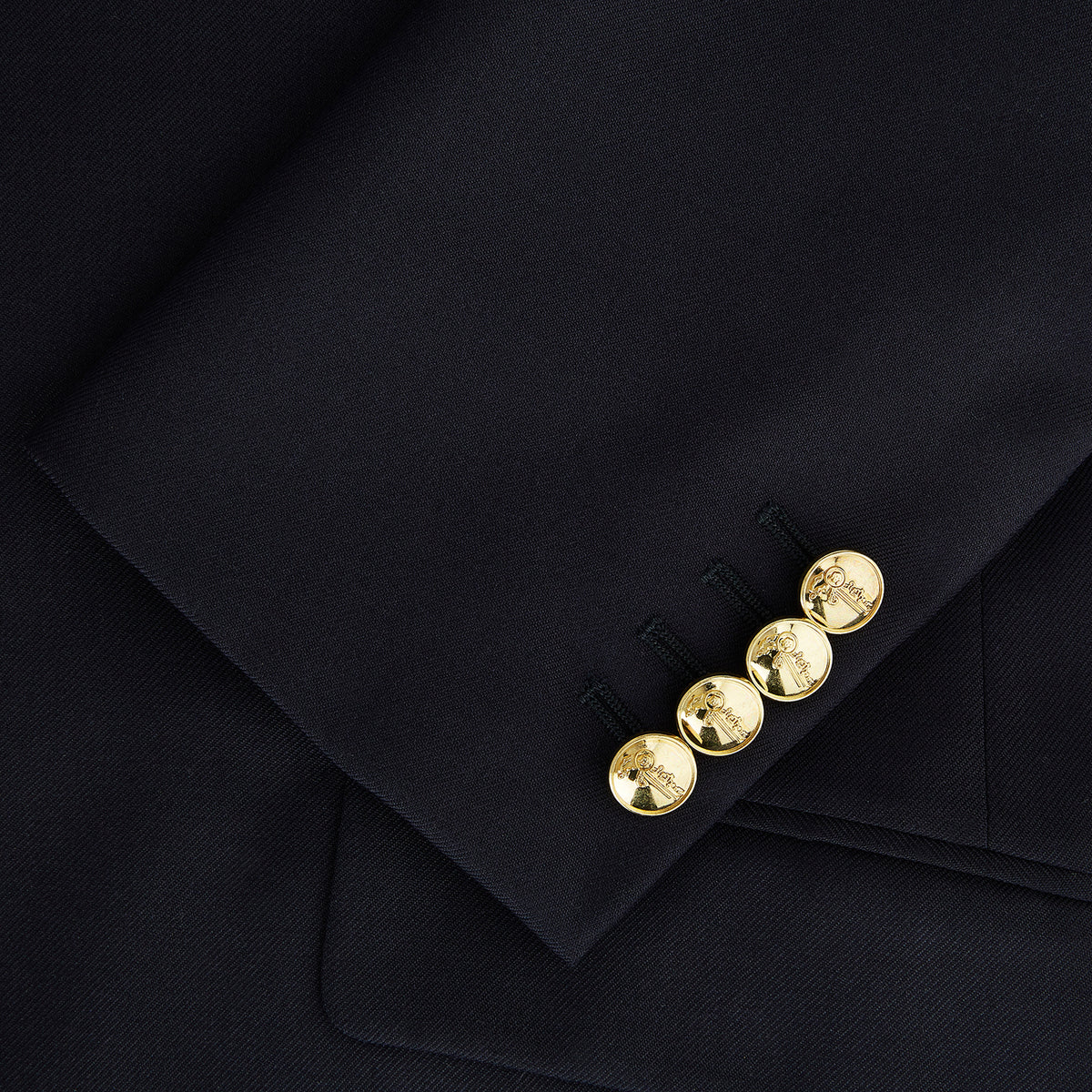 View 4 of product Turnbull & Asser UK Navy Single Breasted Classic Blazer in Wool Gabardine, a navy gabardine single-breasted blazer with two gold-tone buttons and a chest pocket, showcasing classic tailoring.