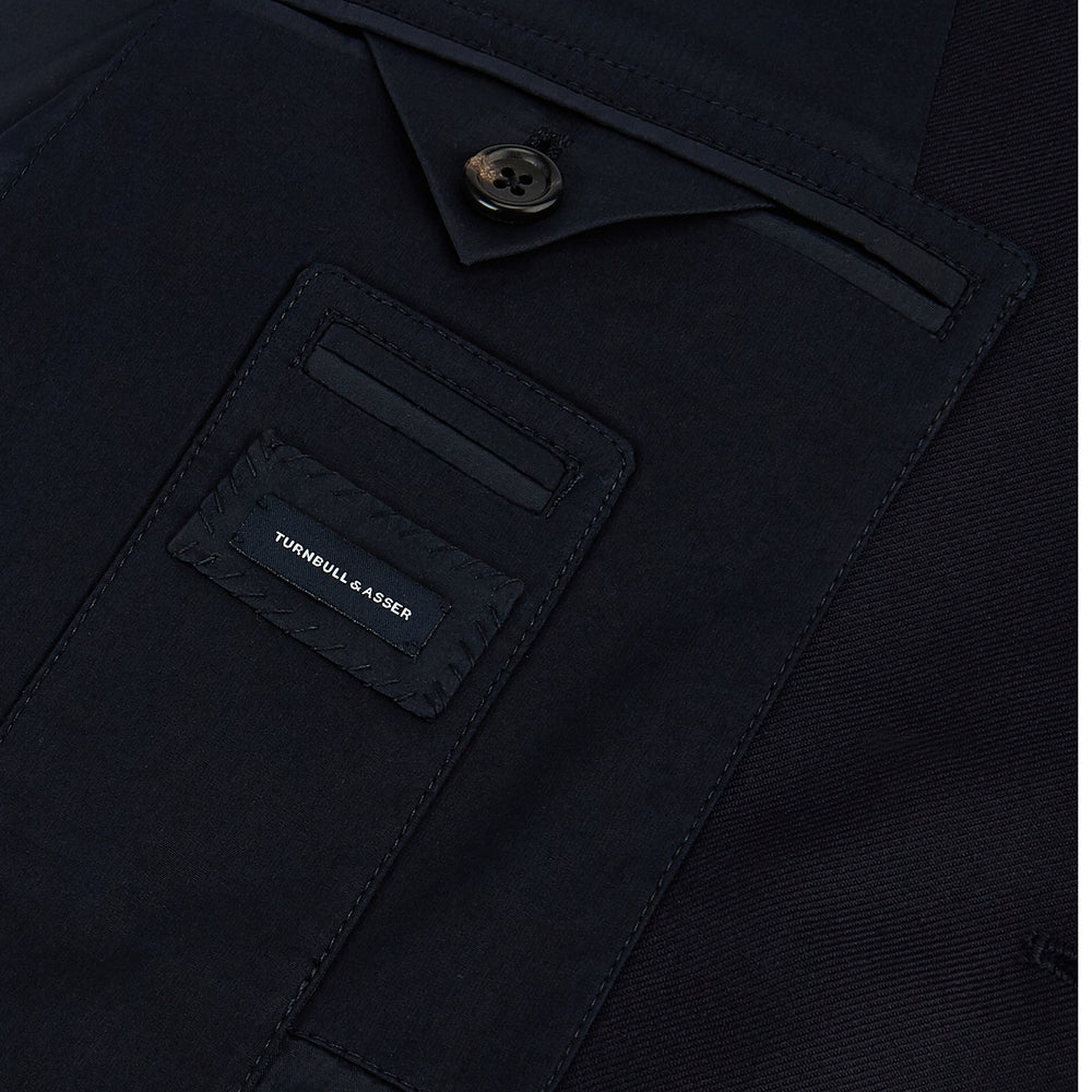 Turnbull & Asser UK Navy Single Breasted Classic Blazer in Wool Gabardine, a navy gabardine single-breasted blazer with two gold-tone buttons and a chest pocket, showcasing classic tailoring.