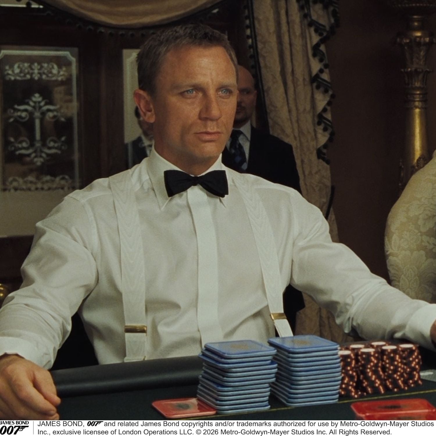 View 2 of product Two White Casino Royale Braces by Turnbull & Asser, as seen on James Bond, handmade in England with silver metal adjusters and leather detailing at the ends—displayed against a plain white background and offering the perfect finishing touch for a 007-inspired look.