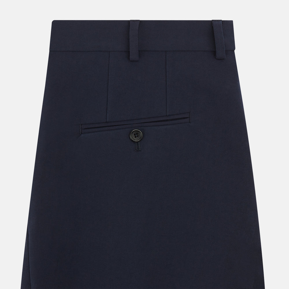 Turnbull & Asser Navy George Trousers in a cotton blend with a single pleat, button and zipper closure, belt loops, and crease detailing down each leg, shown on a plain white background.