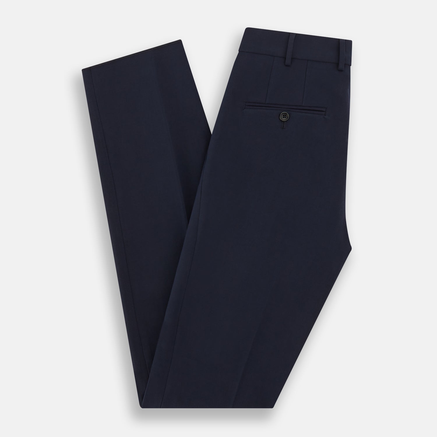 View 5 of product Turnbull & Asser Navy George Trousers in a cotton blend with a single pleat, button and zipper closure, belt loops, and crease detailing down each leg, shown on a plain white background.
