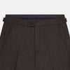View 2 of product Turnbull & Asser Brown Henry Trousers in a tailored fit, crafted from a luxurious wool-cashmere blend with straight legs, front pleats, side pockets, and button closure, shown laid flat on a white background.