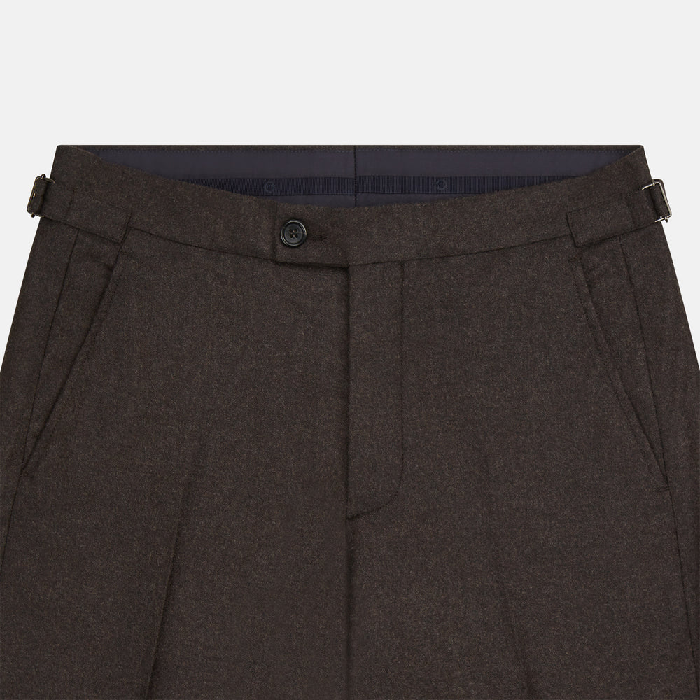 Turnbull & Asser Brown Henry Trousers in a tailored fit, crafted from a luxurious wool-cashmere blend with straight legs, front pleats, side pockets, and button closure, shown laid flat on a white background.