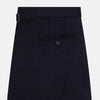 View 3 of product The Turnbull & Asser Midnight Blue Henry Trousers feature a tailored fit, button closure, belt loops, and front pleats in a luxurious wool-cashmere blend, shown against a plain white background.