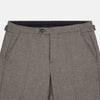 View 2 of product The Stone Henry Trousers by Turnbull & Asser, in a wool-cashmere blend, feature pleats, a button closure, belt loops, and straight legs, shown laid flat on a white background.