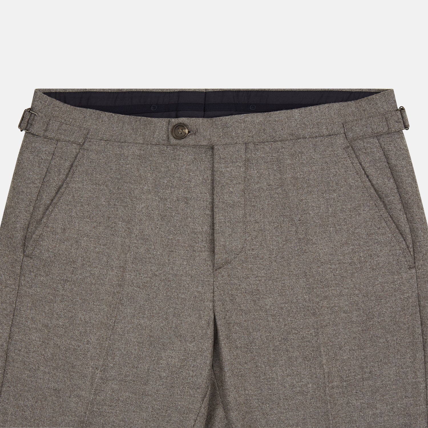 View 2 of product The Stone Henry Trousers by Turnbull & Asser, in a wool-cashmere blend, feature pleats, a button closure, belt loops, and straight legs, shown laid flat on a white background.