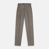 View 1 of product The Stone Henry Trousers by Turnbull & Asser, in a wool-cashmere blend, feature pleats, a button closure, belt loops, and straight legs, shown laid flat on a white background.