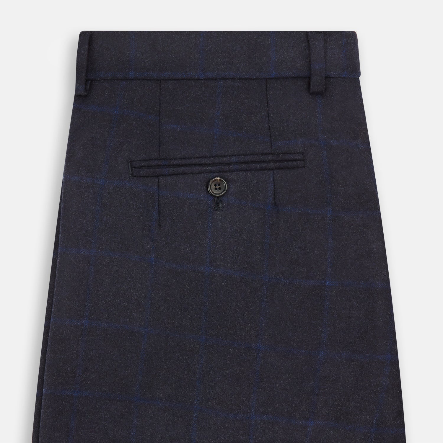 View 4 of product Turnbull & Asser Blue Checked Navy Rupert Trousers, crafted from a premium wool-cashmere blend, feature a subtle Prince of Wales check, belt loops, button closure, and straight legs. Shown on a plain white background.