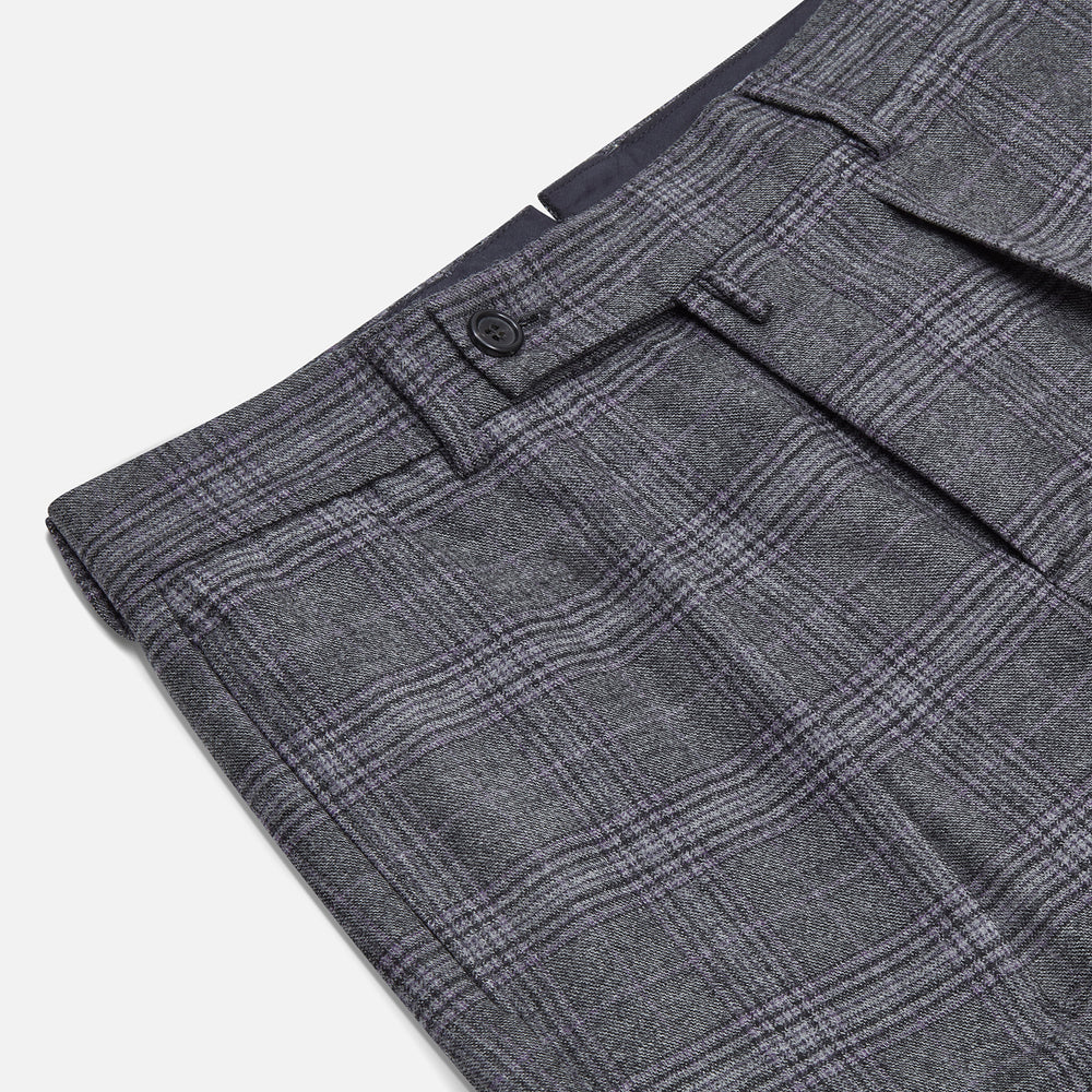 Turnbull & Asser's Grey Check Edward Trousers feature a tailored fit, front pleats, waistband with belt loops, and button closure—crafted from a wool-cotton blend. Ideal for semi-formal wear. Shown on a plain white background.