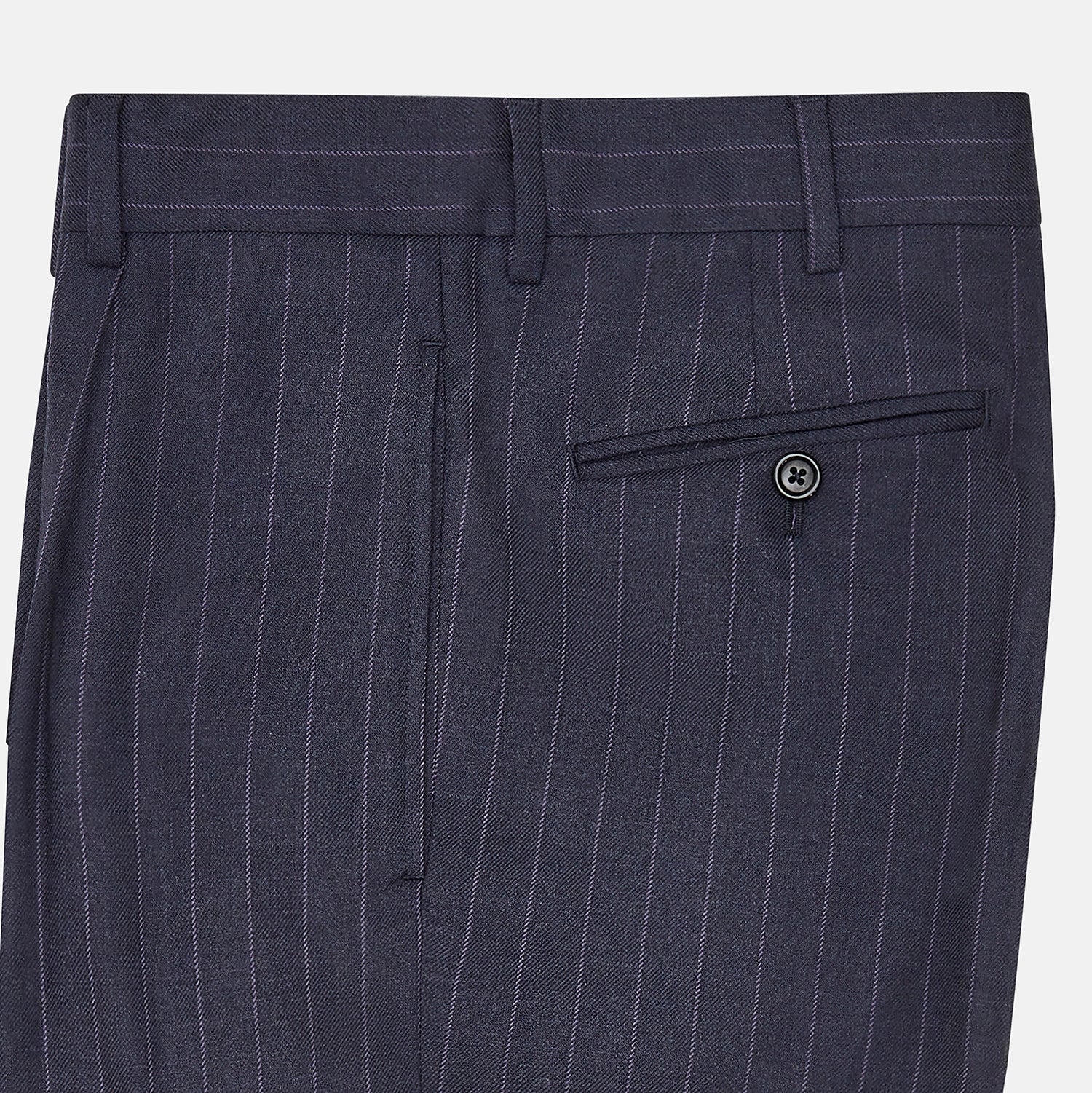 View 4 of product The Navy Pinstripe Arthur Trousers by Turnbull & Asser feature white vertical stripes, front pleats, a button closure, belt loops, and straight legs—adding modern menswear style to your wardrobe. Shown on a plain white background.