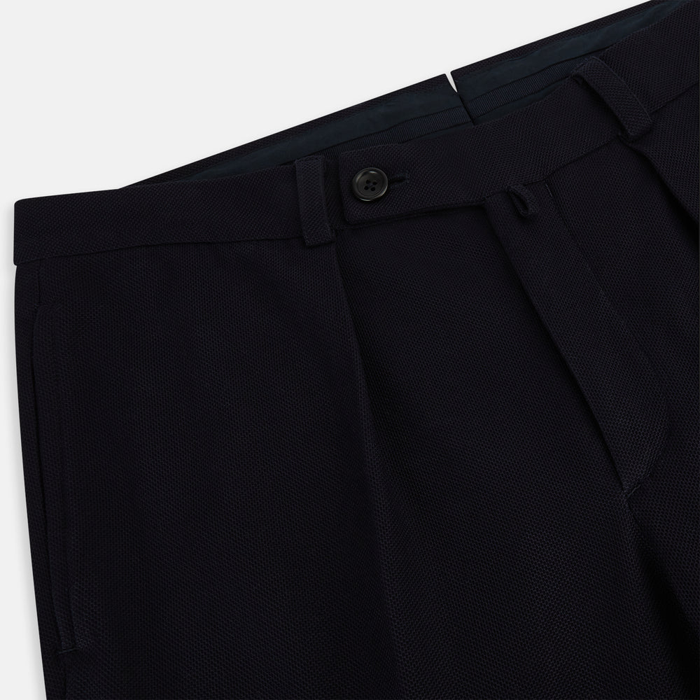 Turnbull & Asser Navy Knitted London Trousers feature a high waist, pleated tailoring, and a straight leg fit, displayed against a plain white background.