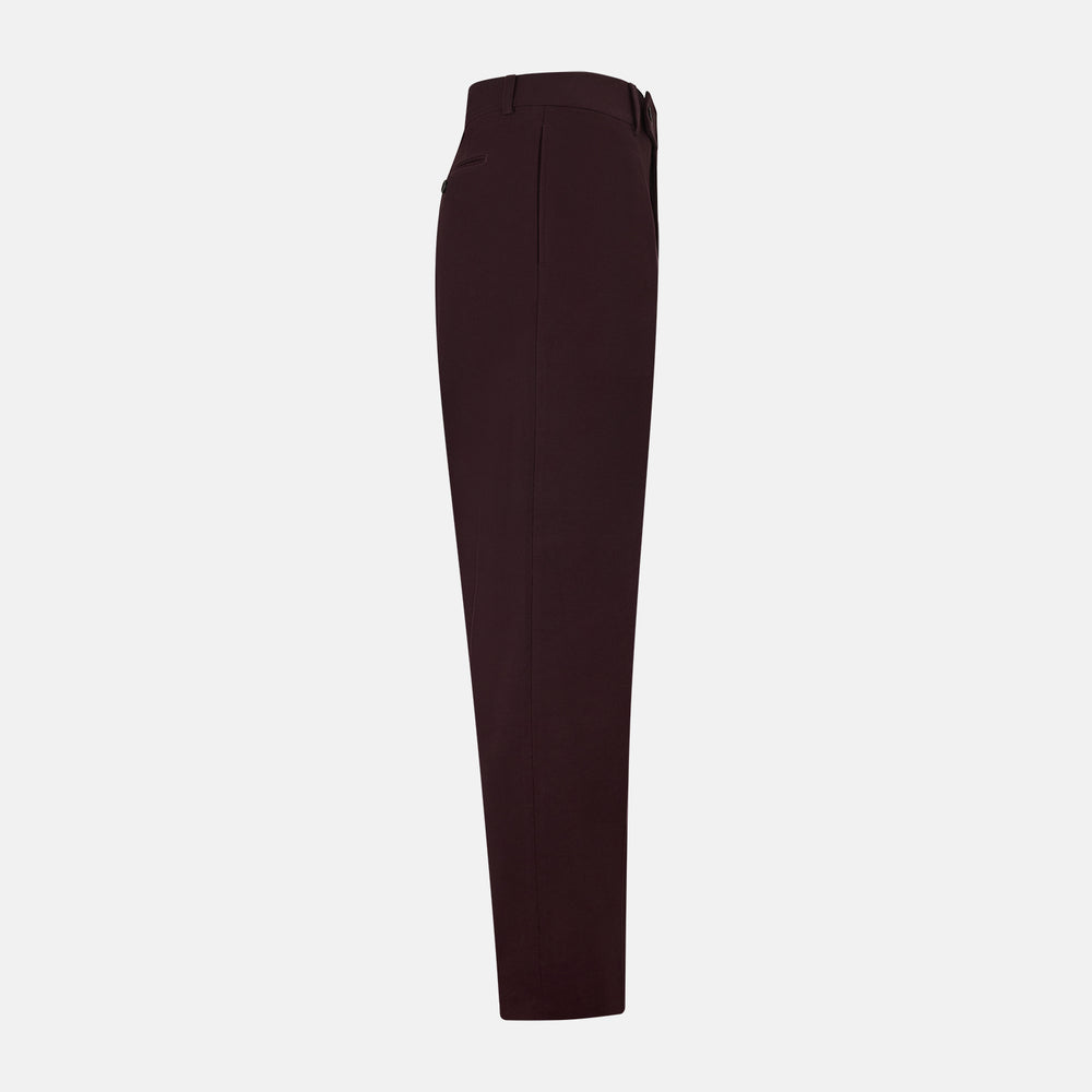 A pair of Burgundy Knitted London Trousers by Turnbull & Asser, featuring a tailored fit, button closure, front pleats, belt loops, and straight legs, displayed on a plain white background.