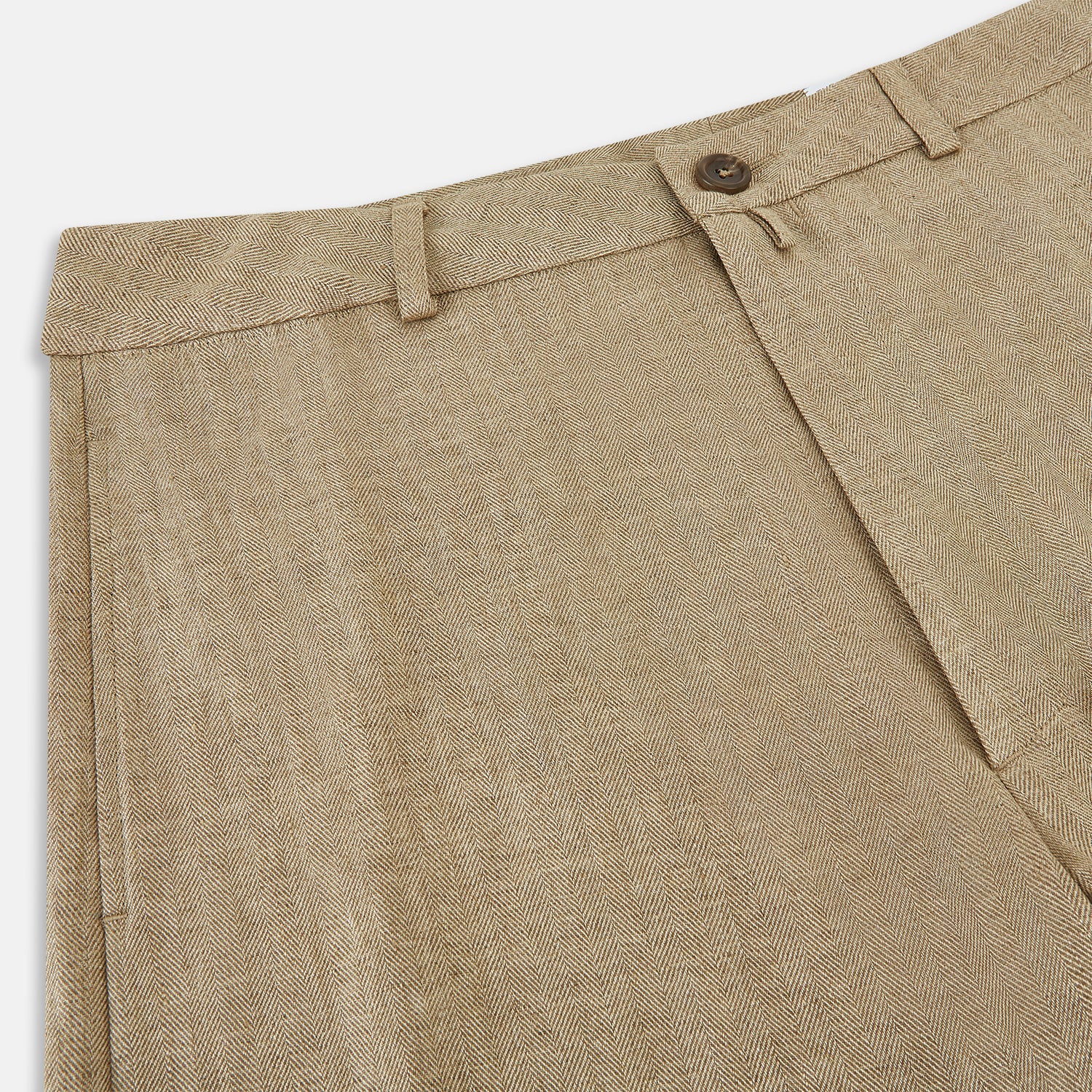 View 2 of product The Sand Linen Amberley Trousers by Turnbull & Asser UK are high-waisted, straight-leg, light brown herringbone linen trousers with belt loops, a front button, and zip closure, shown against a plain white background.