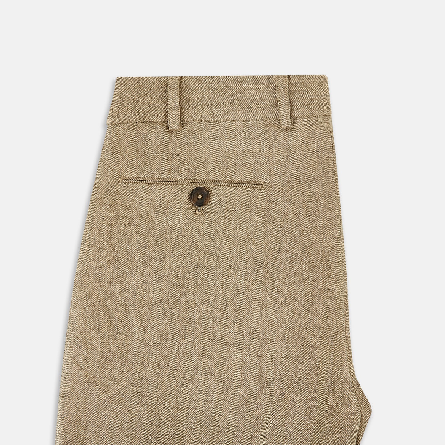 View 6 of product The Sand Linen Amberley Trousers by Turnbull & Asser UK are high-waisted, straight-leg, light brown herringbone linen trousers with belt loops, a front button, and zip closure, shown against a plain white background.