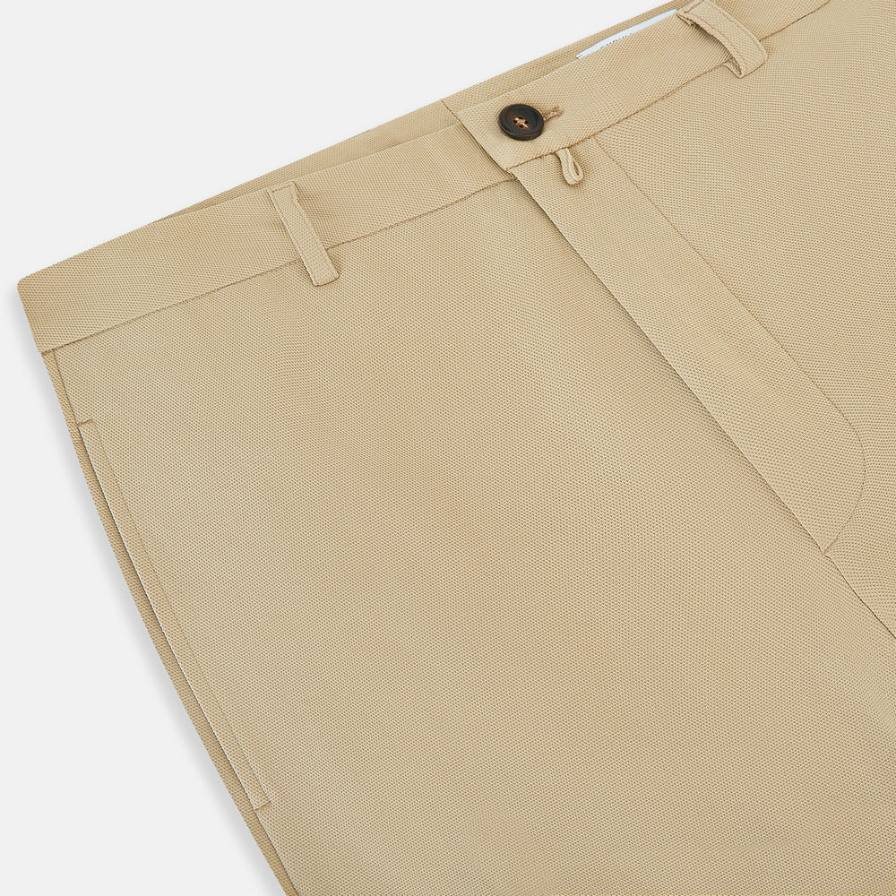 Amberley Sand Trousers in Cotton by Turnbull & Asser UK, featuring a straight-leg silhouette in beige cotton canvas with a button and zip closure, displayed against a plain white background.