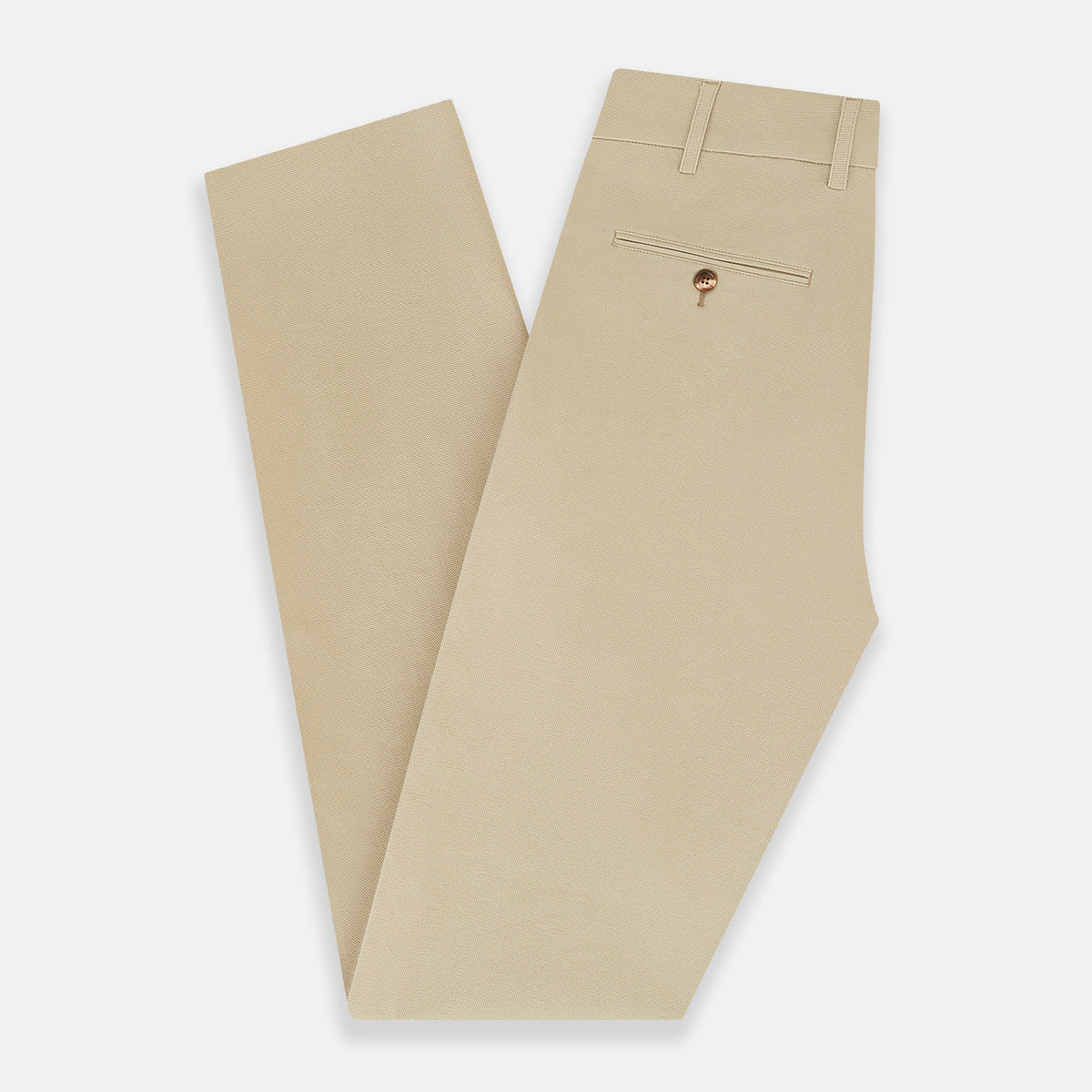 View 6 of product Amberley Sand Trousers in Cotton by Turnbull & Asser UK, featuring a straight-leg silhouette in beige cotton canvas with a button and zip closure, displayed against a plain white background.