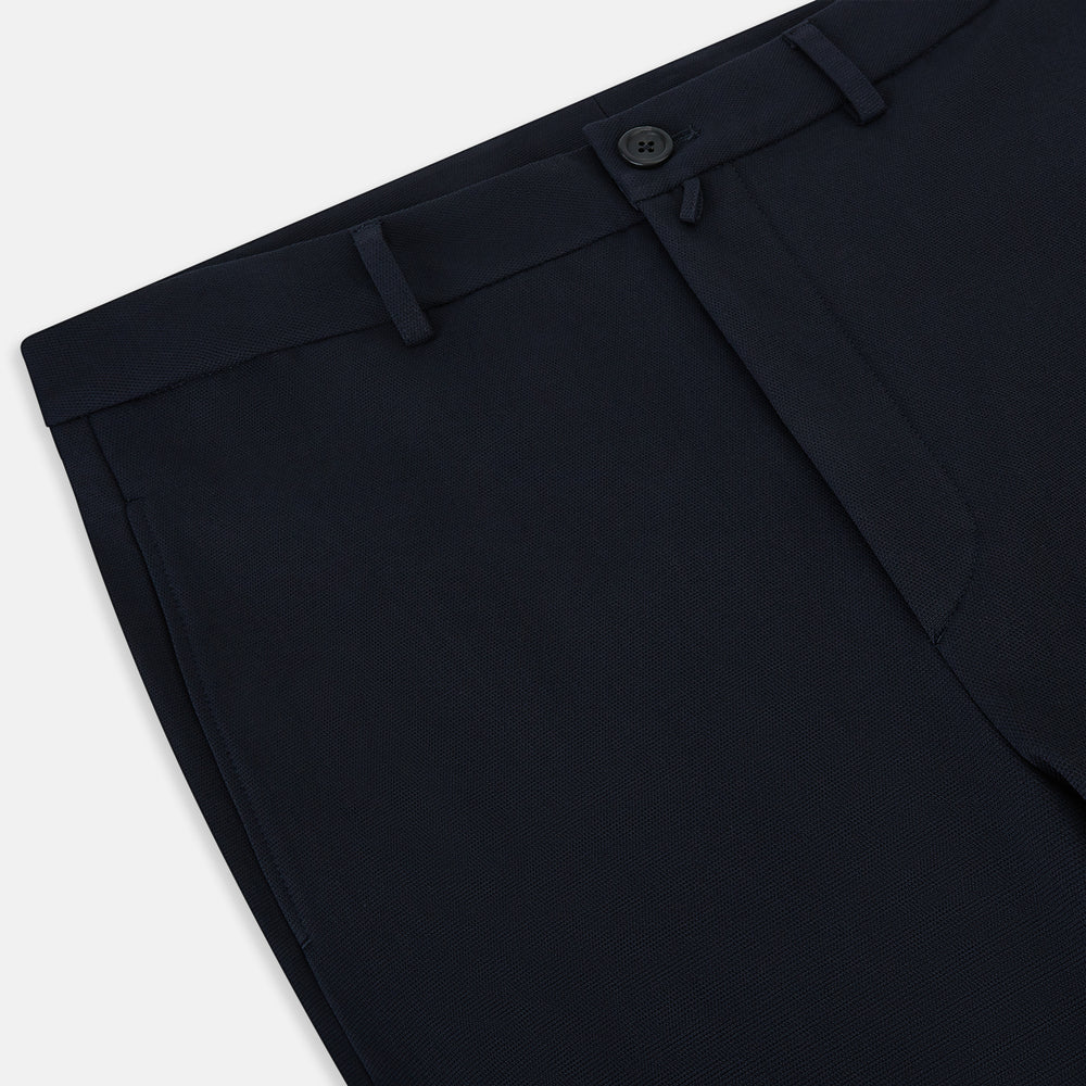 A pair of navy, straight-leg Amberley trousers in cotton by Turnbull & Asser UK, featuring belt loops, a button closure, and a zip fly in the classic Windsor style, displayed on a plain white background.