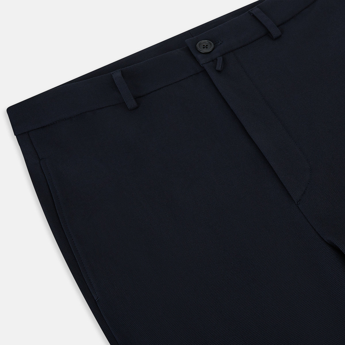 View 2 of product A pair of navy, straight-leg Amberley trousers in cotton by Turnbull & Asser UK, featuring belt loops, a button closure, and a zip fly in the classic Windsor style, displayed on a plain white background.
