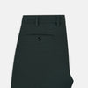 View 5 of product Amberley Forest Green Trousers in Cotton by Turnbull & Asser UK, featuring a straight-leg design with belt loops, button and zip closure, and side pockets, displayed on a plain white background.
