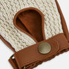 View 3 of product A pair of Cognac Tan Fingerless Driving Gloves in Leather by Turnbull & Asser UK, featuring cream crochet backs, snap closures, and a fingerless design, displayed from the front and back on a white background.