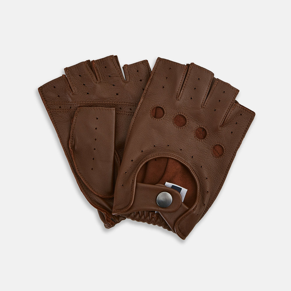 A pair of Turnbull & Asser UK Coffee Brown Fingerless Driving Gloves in leather, featuring perforated knuckles, a snap closure, and an elastic wristband, are displayed palm-up and palm-down on a white background.