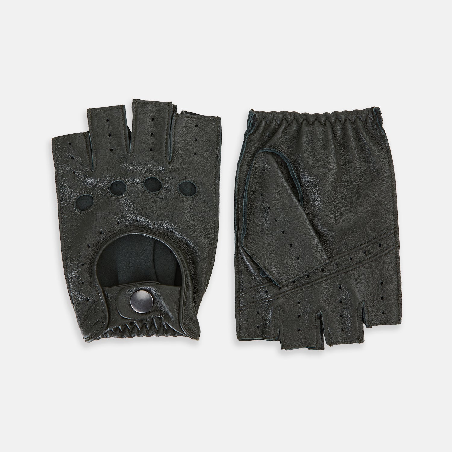 View 1 of product A pair of Forest Green Fingerless Driving Gloves in leather by Turnbull & Asser UK, one displayed palm-up to show the snap closure and the other back-up to highlight the perforated details reminiscent of classic knuckle hole gloves.