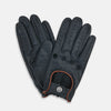 View 2 of product A pair of navy leather driving gloves from Turnbull & Asser UK, featuring perforations and snap closures; one glove displays the palm side while the other shows the back. These unlined Navy Driving Gloves combine style and flexibility for an optimal driving experience.
