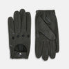 View 1 of product A pair of forest green leather unlined driving gloves from Turnbull & Asser UK, featuring perforated knuckles and backs, snap closures, and visible stitching, displayed flat on a white background. These gloves offer flexibility and comfort for an exceptional driving experience.