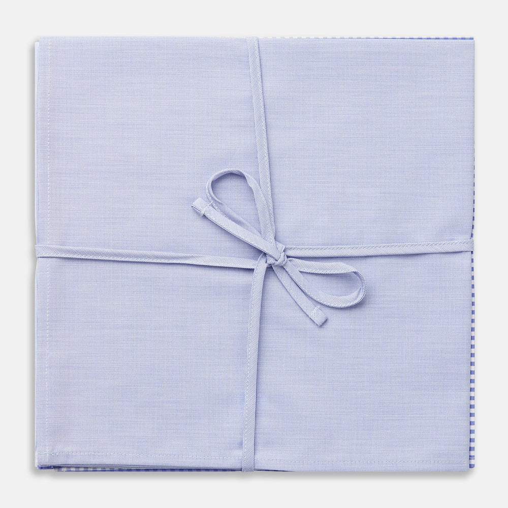Turnbull & Asser's Blue Cotton Handkerchiefs 3-pack features three luxury designs—light blue, blue and white checks, and subtle stripes—elegantly displayed on a plain white background.