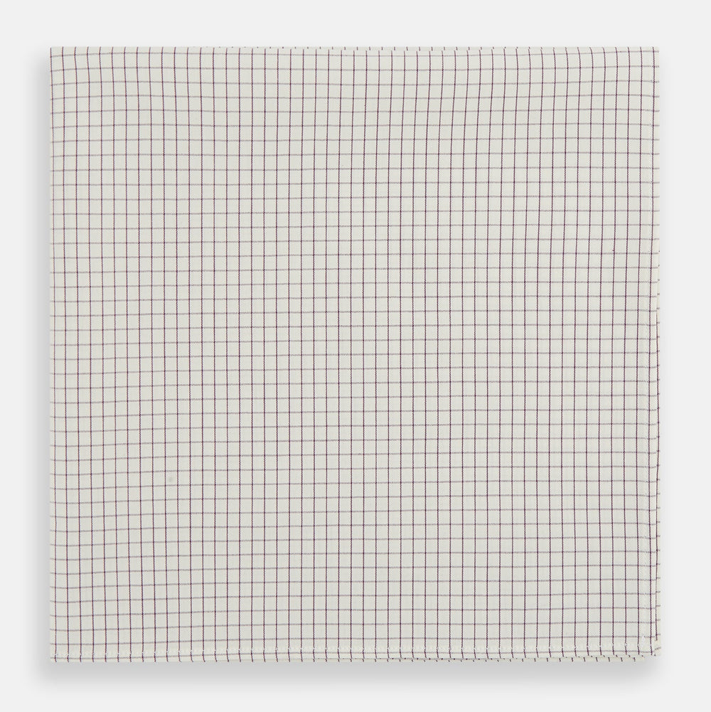 The Turnbull & Asser Purple Graph Check Handkerchief features small, evenly spaced purple lines forming squares, displayed flat against a white background.