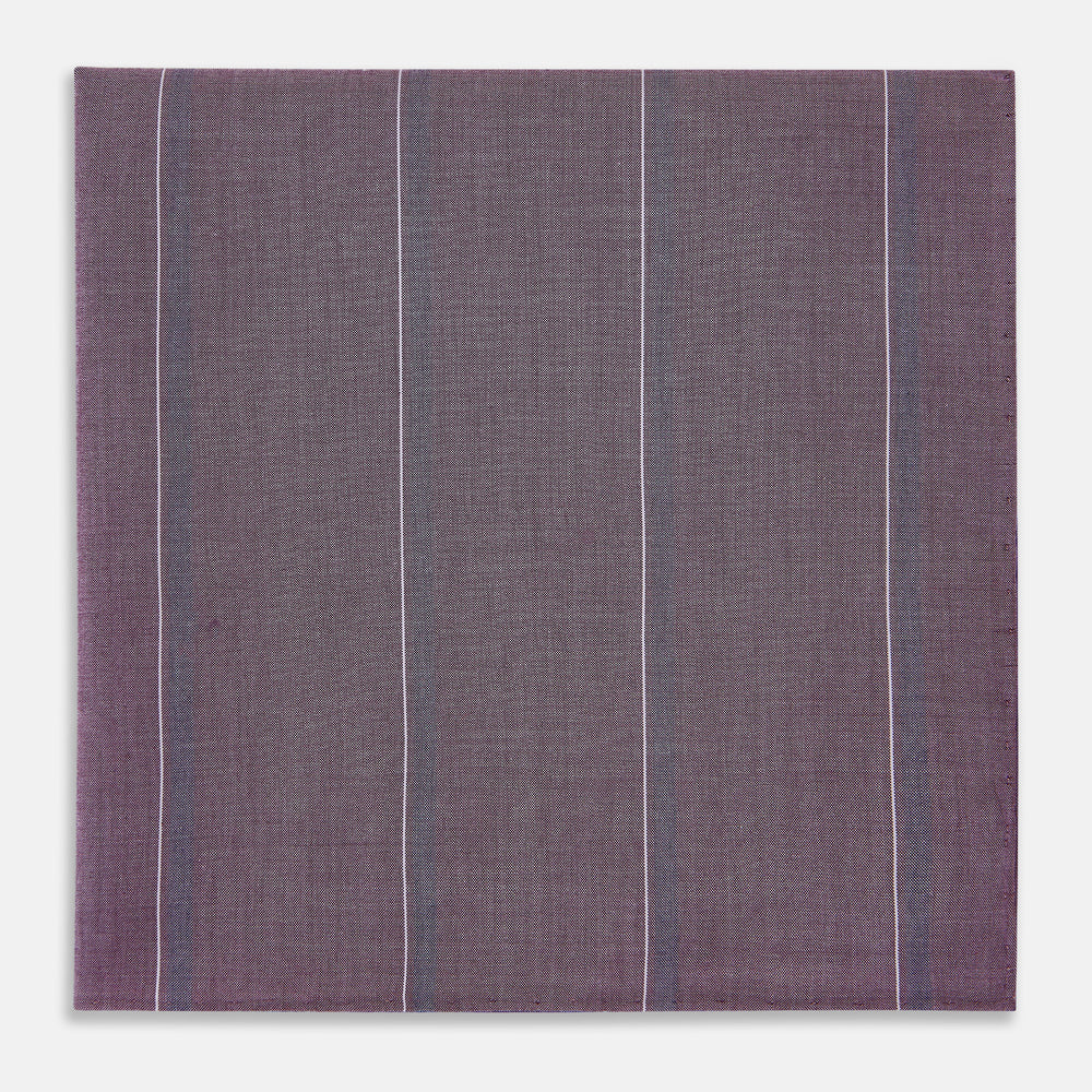 The Porto Red Track Stripe Hand-Rolled Handkerchief by Turnbull & Asser UK is a square piece of fabric in a rich red hue, featuring thin, evenly spaced vertical stripes and a subtle woven texture, expertly crafted in England with hand-rolled edges for a refined finish.