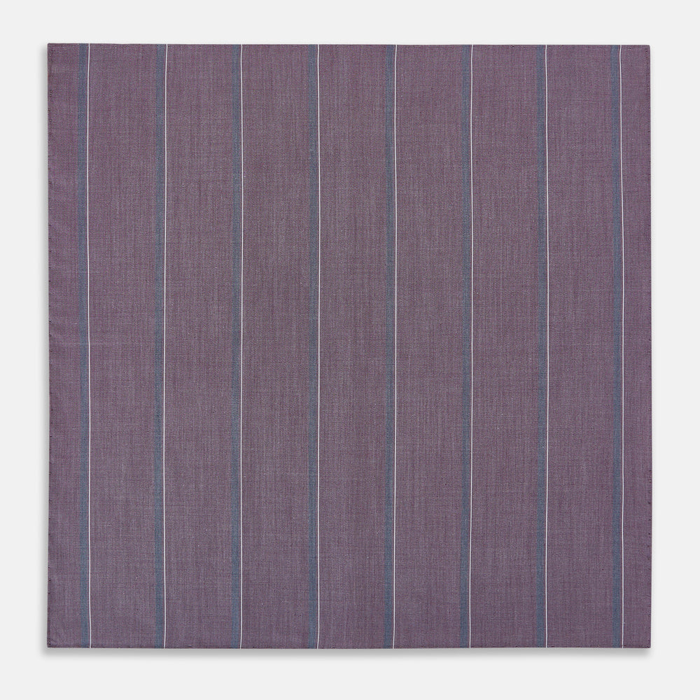 The Porto Red Track Stripe Hand-Rolled Handkerchief by Turnbull & Asser UK is a square piece of fabric in a rich red hue, featuring thin, evenly spaced vertical stripes and a subtle woven texture, expertly crafted in England with hand-rolled edges for a refined finish.