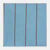 View 1 of product The Turnbull & Asser UK Cendre Blue Track Stripe Hand-Rolled Handkerchief is displayed folded against a plain background, showcasing its cendre blue color with a track stripe pattern—three vertical gray stripes and one thin light blue stripe—and expertly finished with meticulously hand-rolled edges.