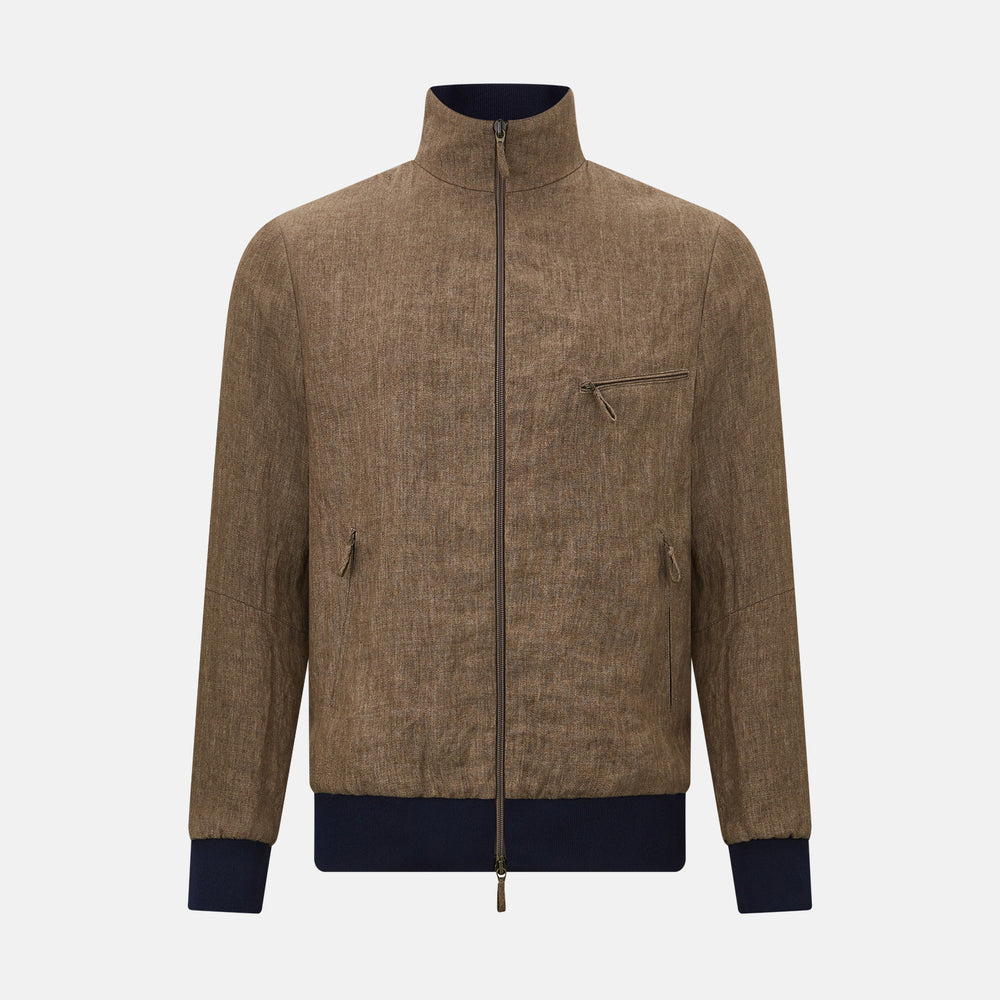 The Fairway Pinecone Golf Jacket in Linen by Turnbull & Asser UK is a brown zip-up jacket featuring a high collar, two side pockets, a zippered chest pocket, and dark cuffs and hem. Crafted from lightweight herringbone linen, it is displayed on a white background.