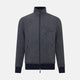 A front view of the Fairway Ash Golf Jacket in Linen by Turnbull & Asser UK is shown, featuring a high collar, two side zip pockets, a chest zip pocket, and black ribbed cuffs and hem. Crafted from lightweight gray herringbone linen for effortless warm-weather dressing, the jacket is displayed on a plain white background.