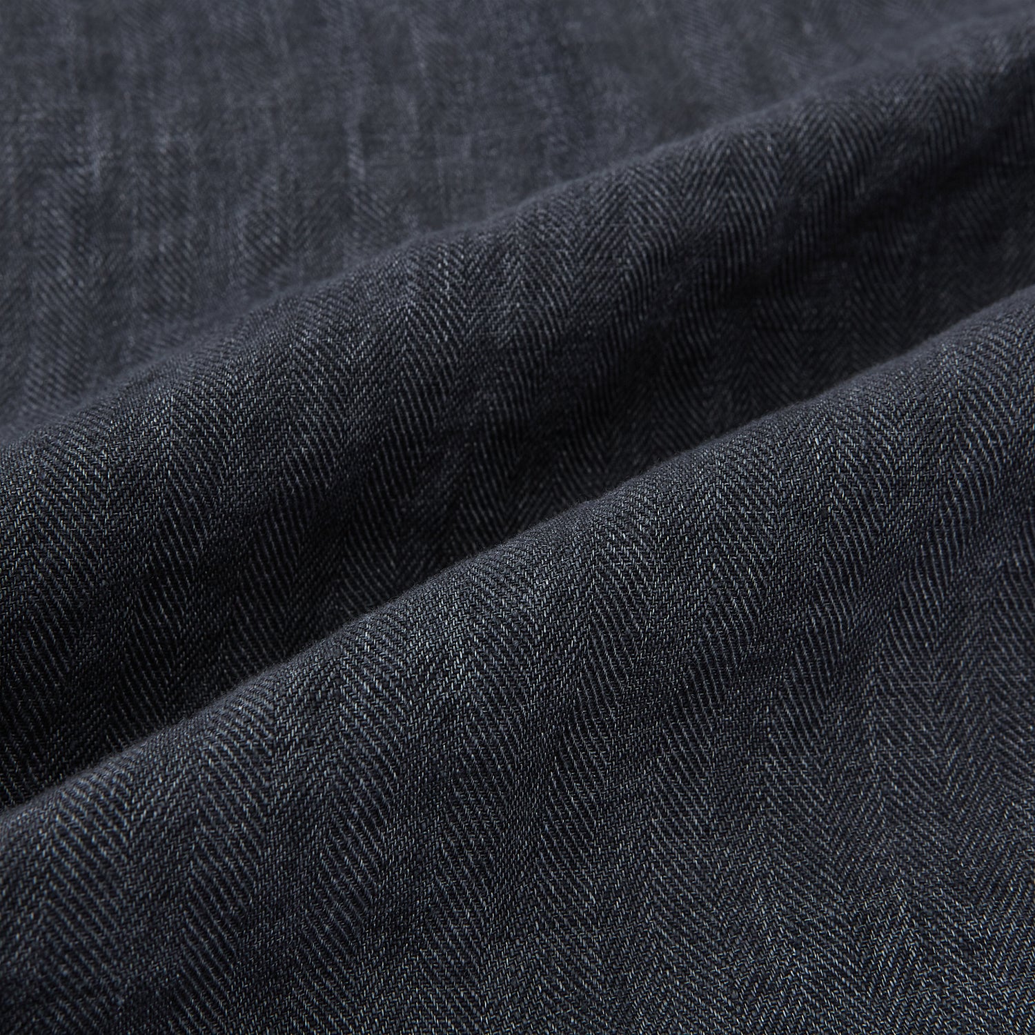 View 5 of product A front view of the Fairway Ash Golf Jacket in Linen by Turnbull & Asser UK is shown, featuring a high collar, two side zip pockets, a chest zip pocket, and black ribbed cuffs and hem. Crafted from lightweight gray herringbone linen for effortless warm-weather dressing, the jacket is displayed on a plain white background.