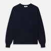 View 1 of product A luxurious navy crew neck cashmere jumper by Turnbull & Asser is laid flat on a white background, evoking timeless Scottish cashmere craftsmanship.
