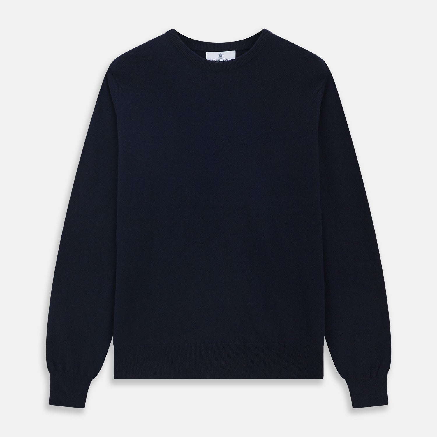 View 1 of product A luxurious navy crew neck cashmere jumper by Turnbull & Asser is laid flat on a white background, evoking timeless Scottish cashmere craftsmanship.
